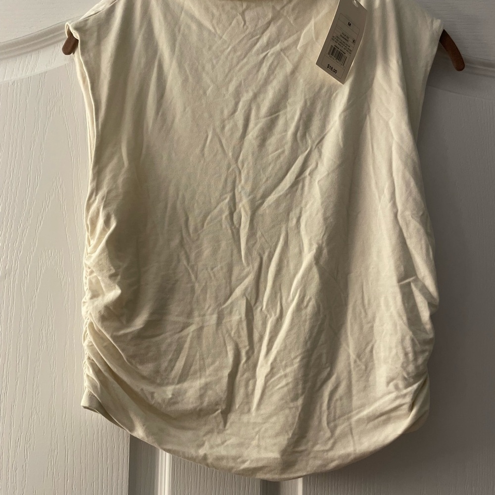 a new day Cream Muscle Tee